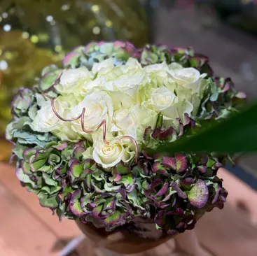 Grafstuk van Floralux Dadizele